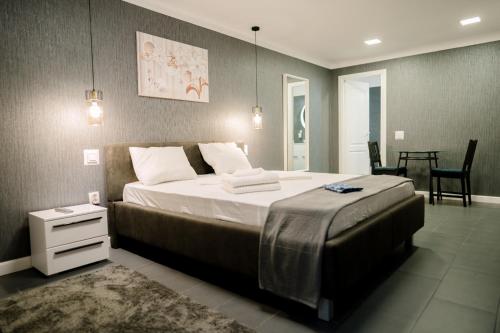 Voodi või voodid majutusasutuse Mavie Apartment Boutique toas