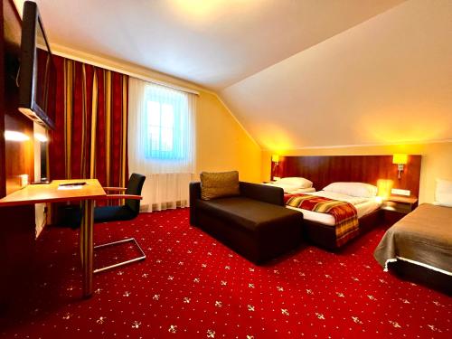 Postel nebo postele na pokoji v ubytování Residenz Royal