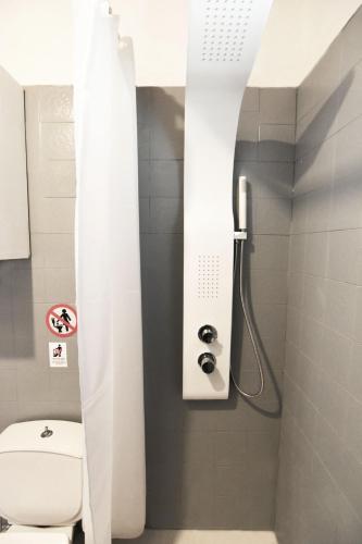 a bathroom with a shower with a toilet in it at Casa Katina , villa in Lagana, Agrilia area in Laganas
