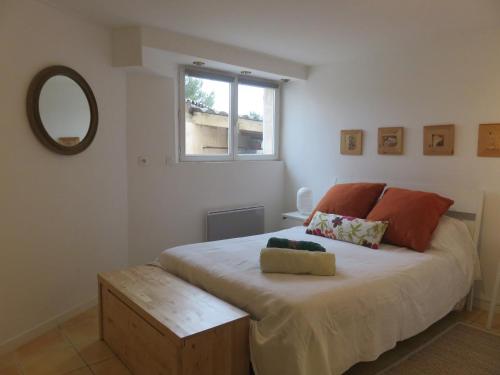 Ліжко або ліжка в номері Les Mondes - Appartement bas de maison