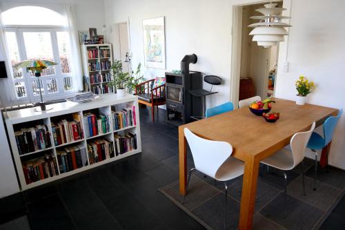 a kitchen and dining room with a table and chairs at Michael's in Copenhagen