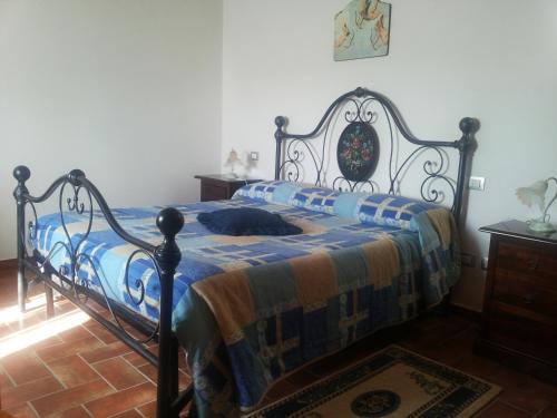 Кровать или кровати в номере Il Poggio del Sole