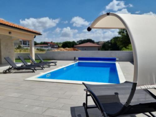 Bazén v ubytování Villa Oasis - pool villa in heart of Istria nebo v jeho okolí