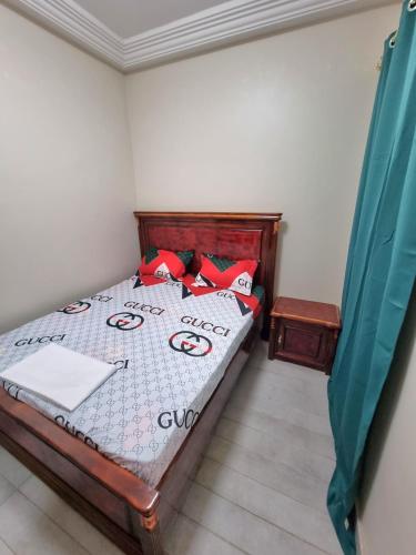 Кровать или кровати в номере SUPERBE APPARTEMENT MEUBLÉ AU BORD DE LA PLAGE