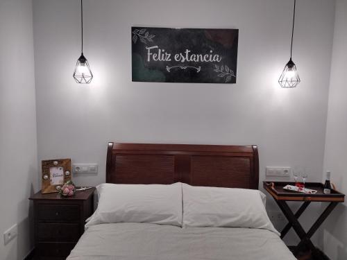 Кровать или кровати в номере Mi Rinconcito