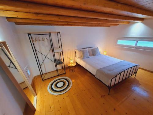 Postel nebo postele na pokoji v ubytování WhiteStone villa mykonos