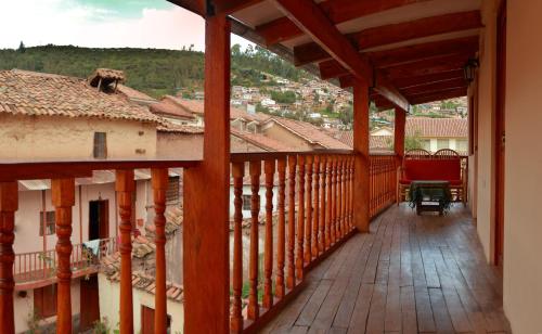 a view from the balcony of a house at Korilazos in Cusco
