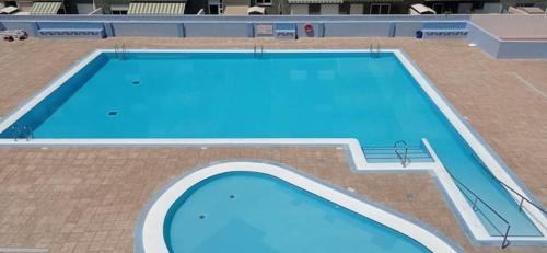 Výhľad na bazén v ubytovaní Bonito estudio en Candelaria con piscinas alebo v jeho blízkosti