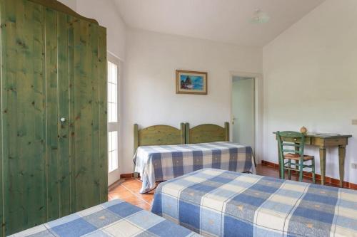 Krevet ili kreveti u jedinici u okviru objekta Villa vacanze Bosa