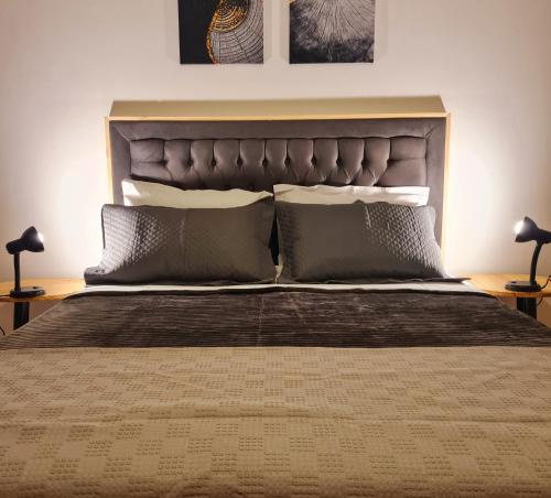 Posteľ alebo postele v izbe v ubytovaní Apartamento Major Nicoletti