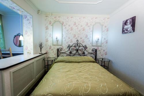 Кровать или кровати в номере Мини-отель Полярный круг