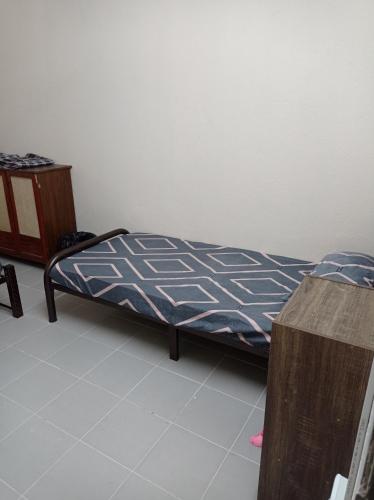 Ένα ή περισσότερα κρεβάτια σε δωμάτιο στο Bonda Guesthouse III