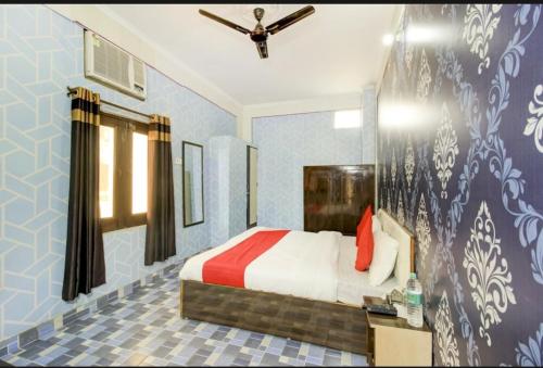 Postel nebo postele na pokoji v ubytování Hotel kingsman