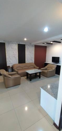 Posezení v ubytování Nanatai Suites