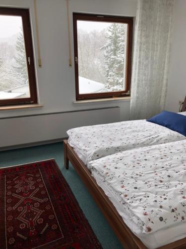 Postel nebo postele na pokoji v ubytování Fewo Marion