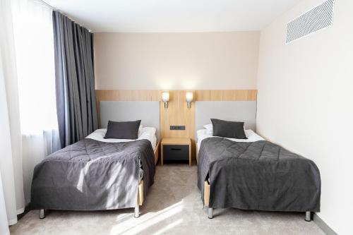 Hotel Сomplex Irtyshにあるベッド