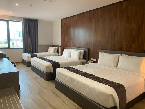 Cama o camas de una habitación en Frame Hotel