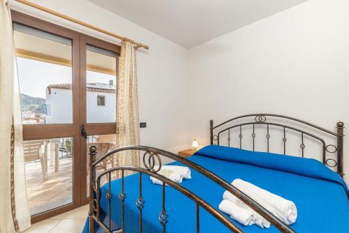 Säng eller sängar i ett rum på Casa sa Montera
