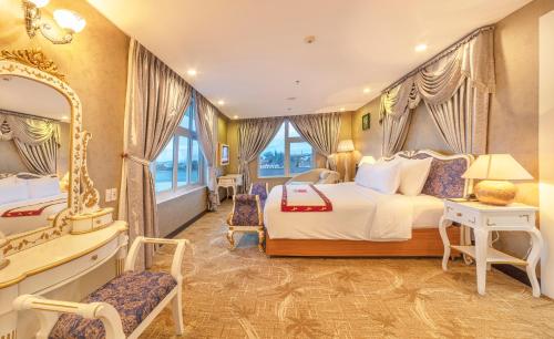 Rúm í herbergi á Vietsovpetro Hotel Dalat