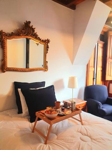 En eller flere senge i et værelse på Porto Alegria Garden