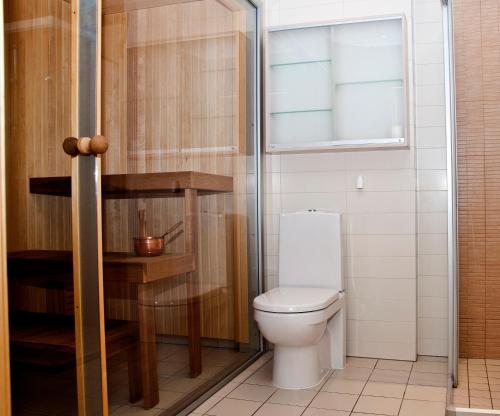 A bathroom at Jalaka Apartment with sauna