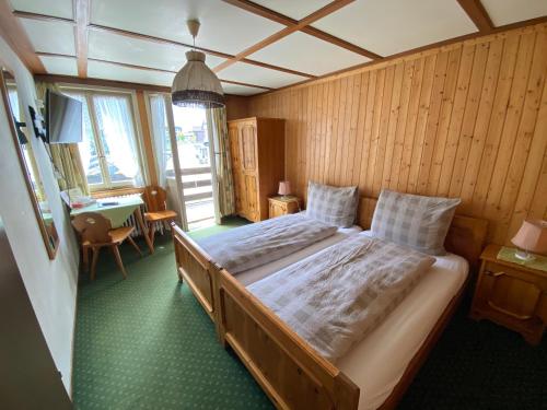מיטה או מיטות בחדר ב-Hotel Steinbock