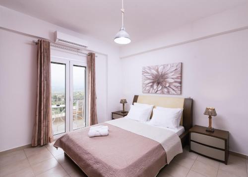 Säng eller sängar i ett rum på Villa Perahori