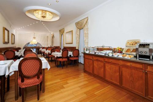 מסעדה או מקום אחר לאכול בו ב-Hotel Raffaello - Sure Hotel Collection by Best Western