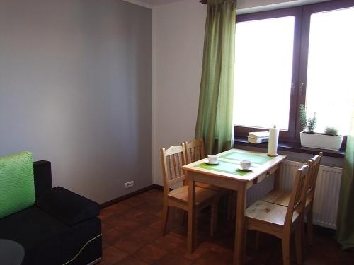 Ruang duduk di Mazurski Zakątek-Apartamenty