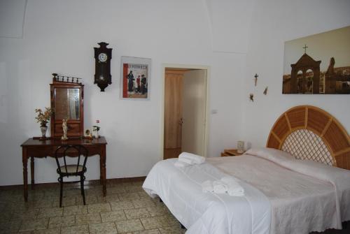 Postel nebo postele na pokoji v ubytování Terra di Leuca