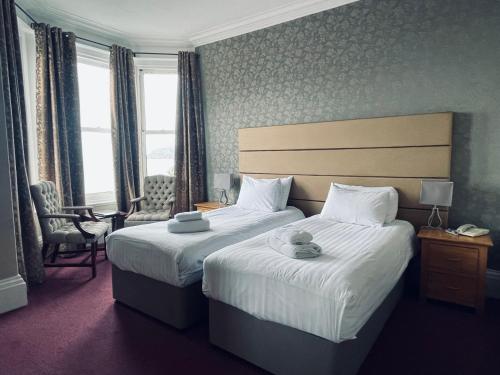 Katil atau katil-katil dalam bilik di Merrion Hotel