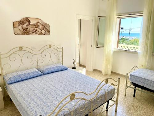 Posteľ alebo postele v izbe v ubytovaní Le macchie - Vacanza nel verde