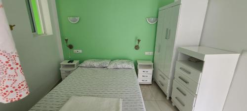 Postel nebo postele na pokoji v ubytování LA MENOR