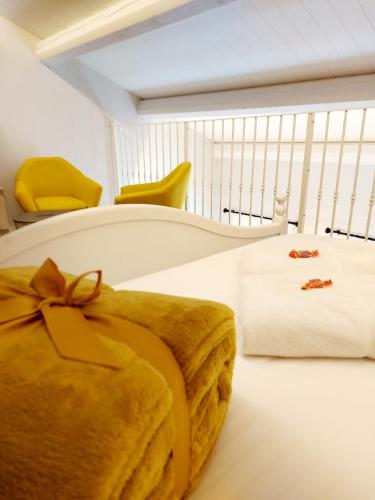 Katil atau katil-katil dalam bilik di Canal Vena ApartSuite House Chioggia