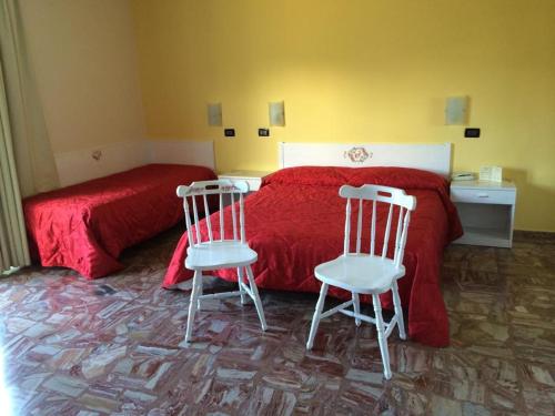 Postel nebo postele na pokoji v ubytování Albergo Carpino