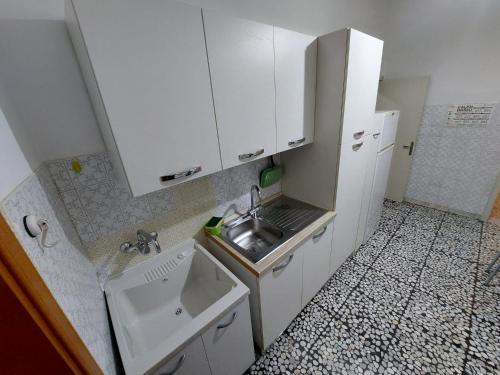 Kuchyňa alebo kuchynka v ubytovaní Casa Gilè
