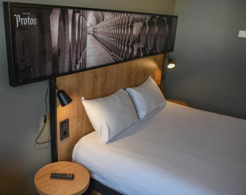Ibis Valladolidにあるベッド