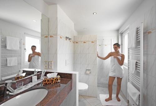 Koupelna v ubytování Akzent Hotel Atrium Baden