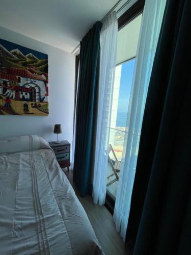 Ein Bett oder Betten in einem Zimmer der Unterkunft Apartamento Vista al Mar