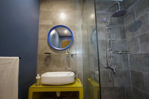 
a bathroom with a sink, toilet and tub at Suite Loc Luxury Aparthotel in Casablanca
