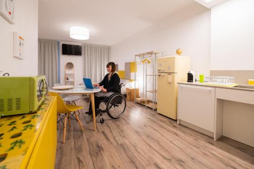 Kuchyň nebo kuchyňský kout v ubytování MAMA Apartments