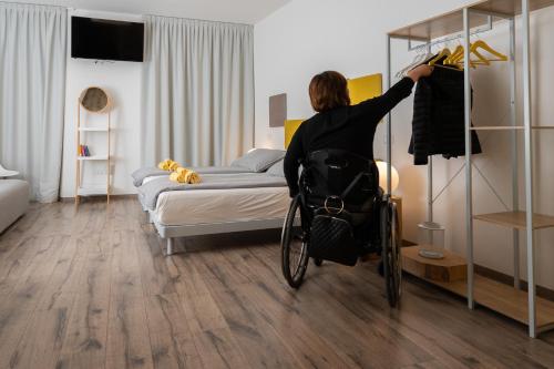 Postel nebo postele na pokoji v ubytování MAMA Apartments
