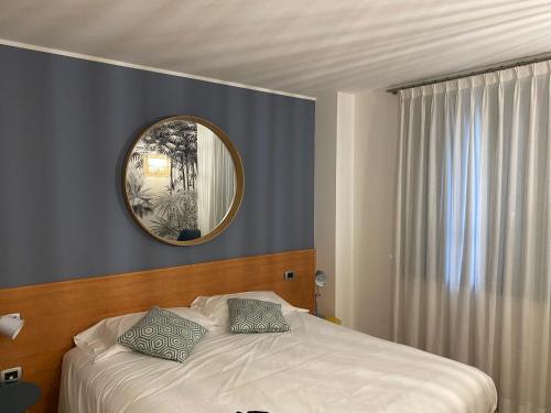 Cama o camas de una habitación en Hotel Residence Ristorante Ramandolo