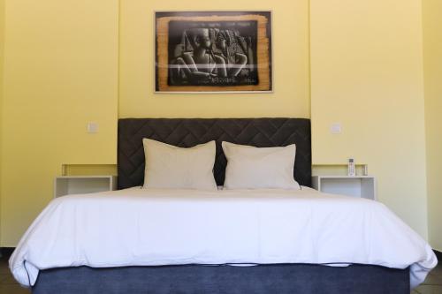 Postel nebo postele na pokoji v ubytování Casa do Largo - Casa Sotto