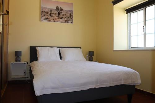 Postel nebo postele na pokoji v ubytování Casa do Largo - Casa Sotto