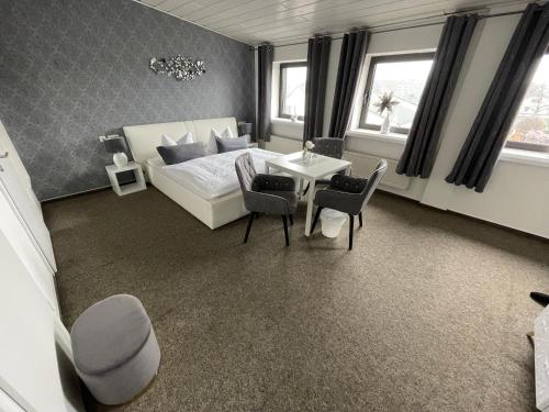Ένα ή περισσότερα κρεβάτια σε δωμάτιο στο Hotel Schwanenburg