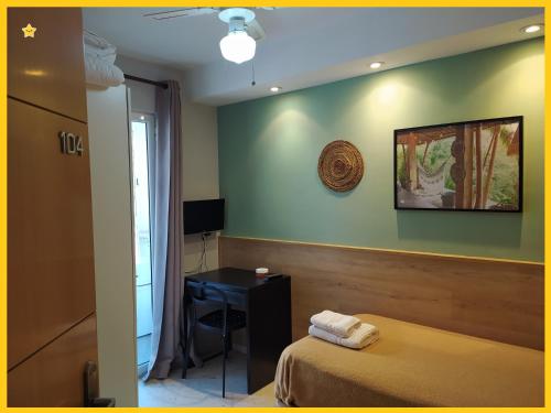 TV a/nebo společenská místnost v ubytování Habitaciones Barra89