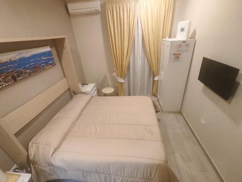 A bed or beds in a room at Sunrise 15
