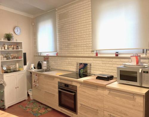 Kjøkken eller kjøkkenkrok på Piccola Suite