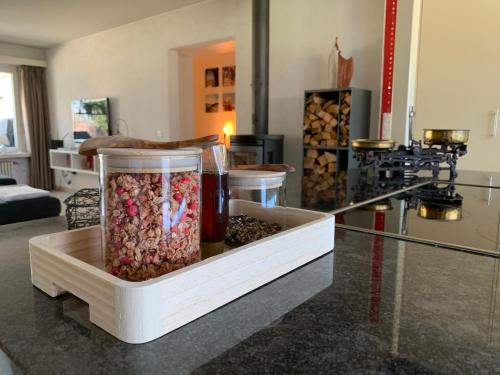 a container filled with different types of food on a counter at Lakelodge Romanshorn in Romanshorn